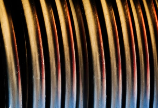 Rolled plastic hose as background photo
