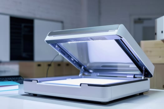 Scanner on a desk in a modern office with a bright workspace and organized materials photo
