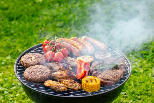 various meat and vegetables on grill photo