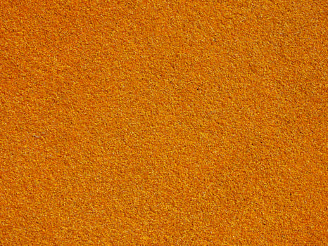industrial style Orange artificial synthetic grass meadow backgr photo