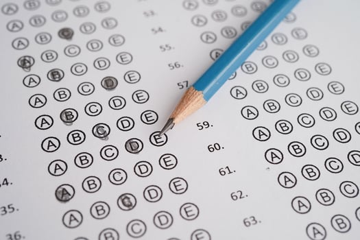 Answer sheets with pencil drawing fill to select choice, education concept. photo