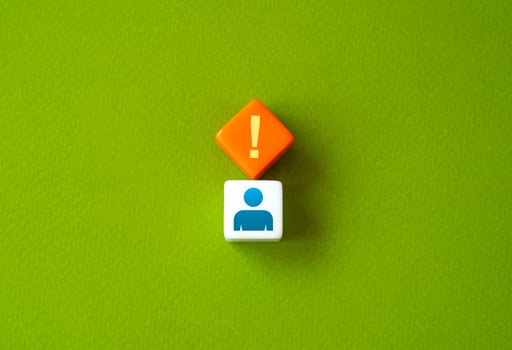 Man with exclamation mark above his head. Concept of mindfulness. Stress and worries. Anxiety. Increased attention. photo