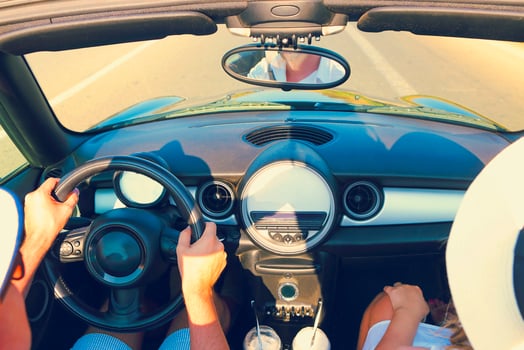 Happy Couple Driving in Car photo