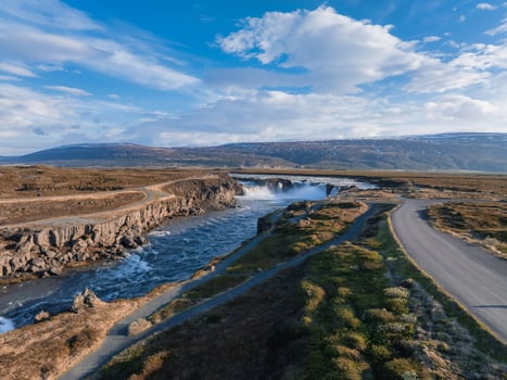 Aerial view of the powerful Godafoss waterfall on a sunny day in Northern Iceland. photo