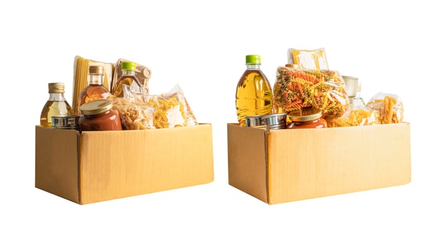 Foodstuff for donation, storage and delivery. Various food, pasta, cooking oil and canned food in cardboard box. photo