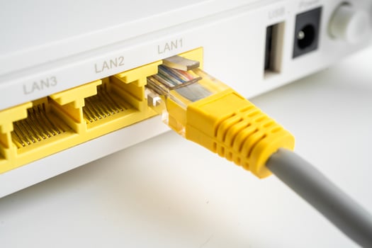 Ethernet cable with wireless router connect to internet service provider internet network. photo