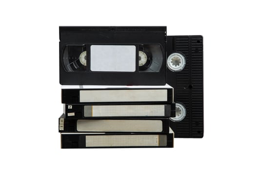 Pile of VHS cassettes. Vintage media. Isolate on a white back. photo