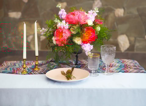 Table setting in vintage style is decorated with flowers photo
