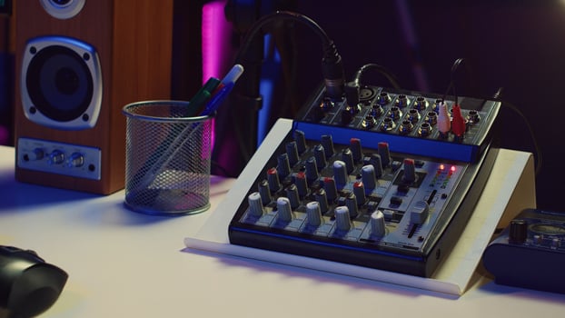 Empty home studio used for recording and mixing music with electronic modern equipment, creating soundtracks with control panel soundboard and mixer console. Signal processing. Camera A. photo
