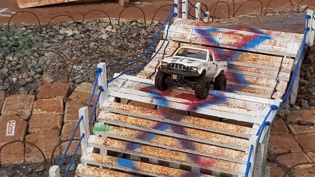 Radio controlled off road car model movement race quickly moving on the road photo