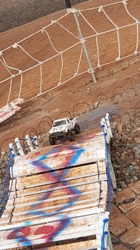 Radio controlled off road car model movement race quickly moving on the road photo