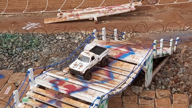 Radio controlled off road car model movement race quickly moving on the road photo