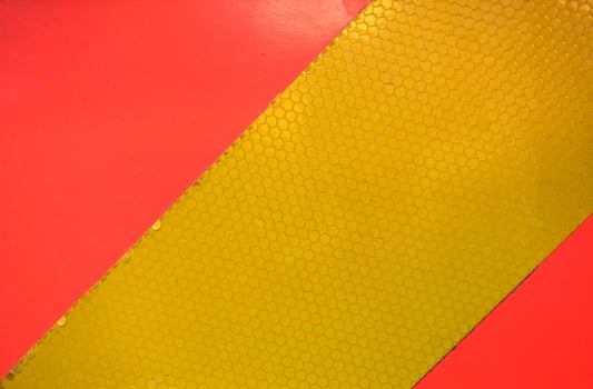 orange and yellow reflective panel photo