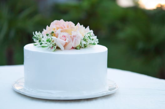 Wedding cake beautiful decorated with roses photo