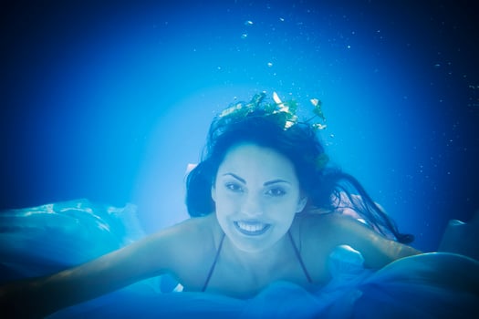 Underwater close up portrait of a woman photo