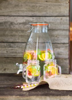 Lemonade with lemon, orange and grapefruit photo