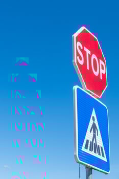 stop sign and pedestrian crossing signal, traffic security photo