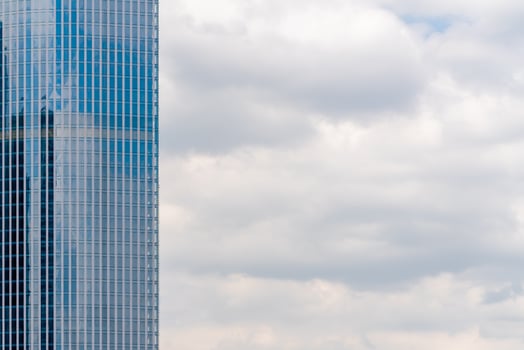 Glass facade of a modern building. Construction and rental housing. photo