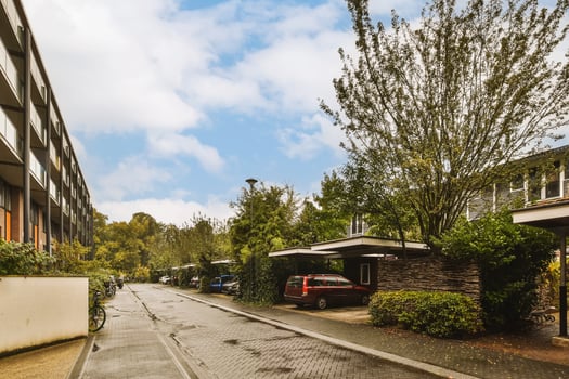A street with cars parked on it photo