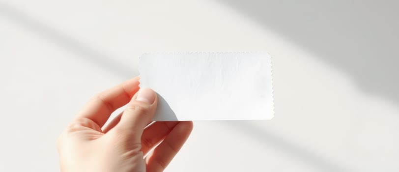 Hand Holding Blank Card With Shadow photo