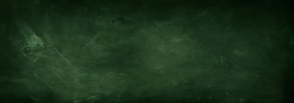 Erased Chalk Marks on Green Chalkboard photo