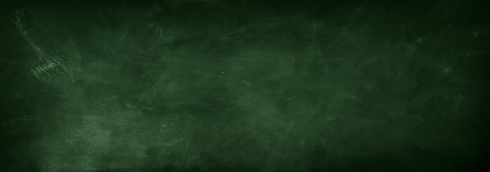 Erased Chalk Marks on Green Chalkboard photo