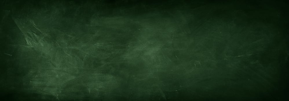 Erased Chalk Marks on Green Chalkboard photo