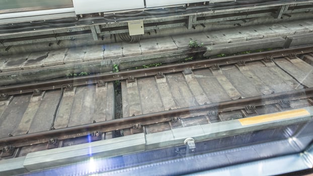 transportation railway electric train railroad track vechicle travel public station mode transport outdoor capital commuter cityscape destination travel trip journey repair business traffic city steel photo