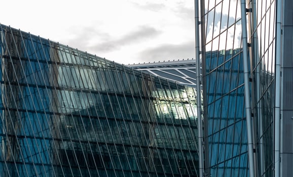 modern architecture, facade elements of contemporary building against evening sky photo