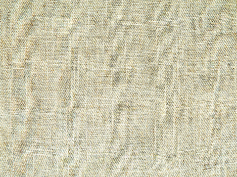 Natural Linen Material Textile Canvas Fabric Texture Background Close-up Detail of Fabric Natural Color Hemp Material Pattern Design Wallpaper. Can be Used as Background or For Graphic Design photo