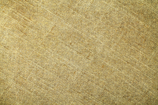 Natural Linen Material Textile Canvas Fabric Texture Background Close-up Detail of Fabric Natural Color Hemp Material Pattern Design Wallpaper. Can be Used as Background or For Graphic Design photo