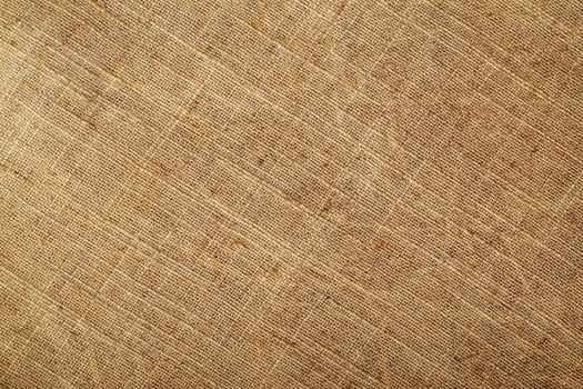 Natural Linen Material Textile Canvas Fabric Texture Background Close-up Detail of Fabric Natural Color Hemp Material Pattern Design Wallpaper. Can be Used as Background or For Graphic Design photo