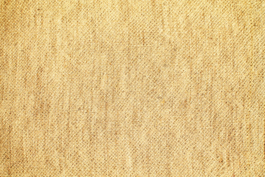 Natural Linen Material Textile Canvas Fabric Texture Background Close-up Detail of Fabric Natural Color Hemp Material Pattern Design Wallpaper. Can be Used as Background or For Graphic Design photo