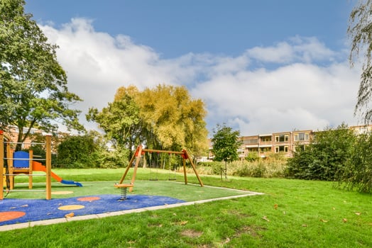 A playground in a park photo