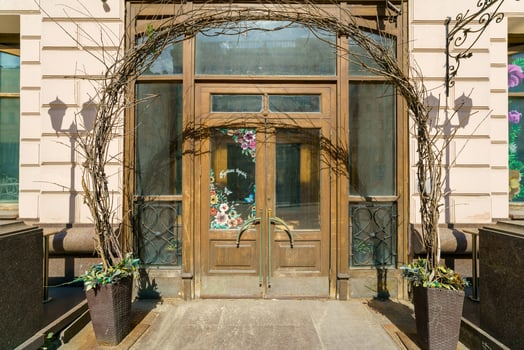 Old beautiful vintage doors in the city wall of the house. photo