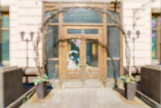 Blurred background of a city street. Blurred photo of a modern city.