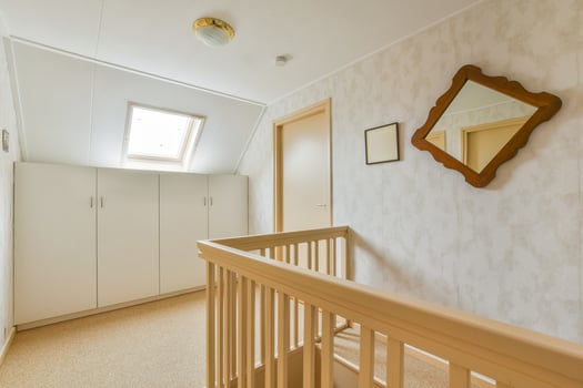 Wooden railing on the stairs photo