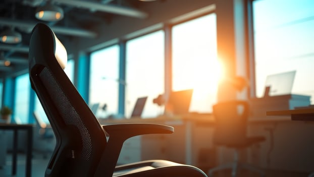 Modern office chair in a bright room with a view of the city photo
