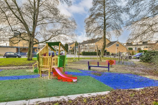 A playground with a slide photo
