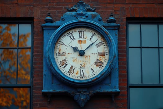Old clock showing time passing on brick wall photo