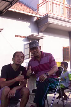 gresik, indonesia, 20 august 2023 - shot on the expression of an old indonesian man photo