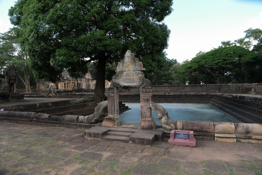 Neatly carved laterite pillar in Prasat Muang Tam, Ancient Historical castle in Thailand. photo