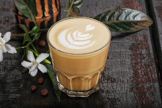 Hot cappuccino coffee in the glass photo