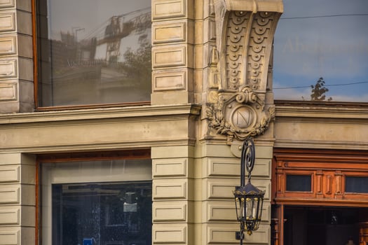 A clock on a building photo