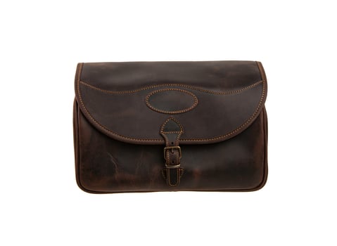 Brown leather bag with metal clasp. Isolate on a white back photo