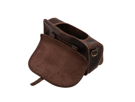Brown leather bag with metal clasp. Isolate on a white back photo