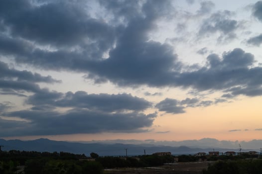 Sunset and storm clouds, North Cyprus photo