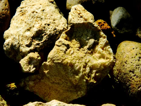 Abstract background with mountain rocks. Large shaped rocks that can be found on the shore of the sea, lake or river. photo