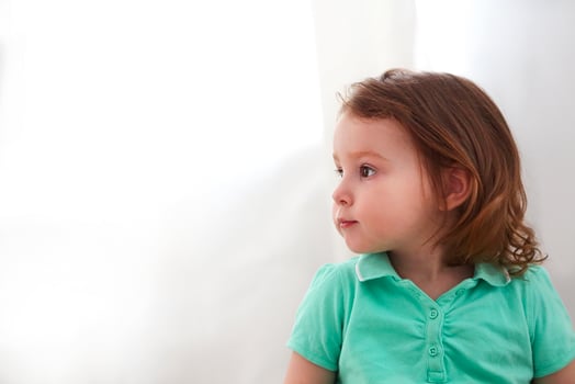 Close up of child profile with red hair photo