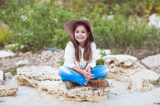 Happy little girl outdoors photo